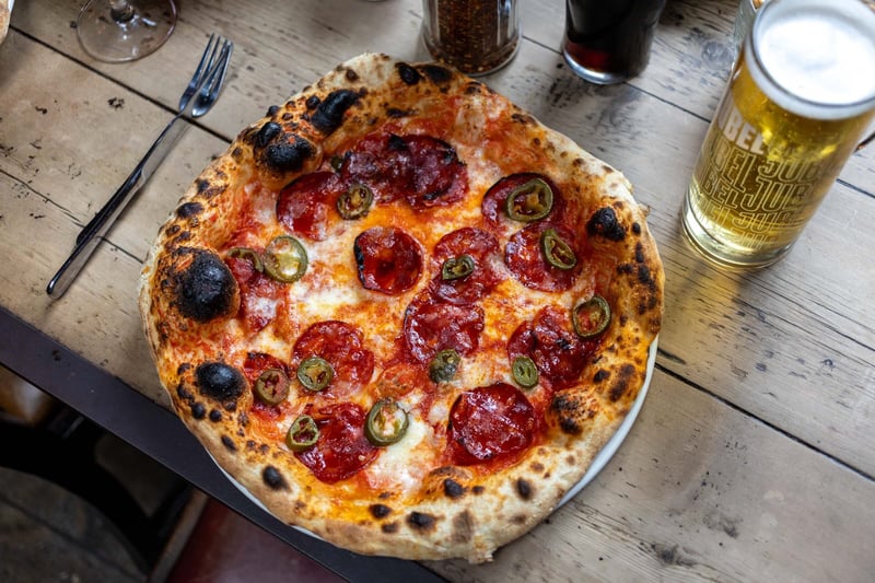 A midday deal you’ll love - pizza paired with a pint, wine, or soft drink