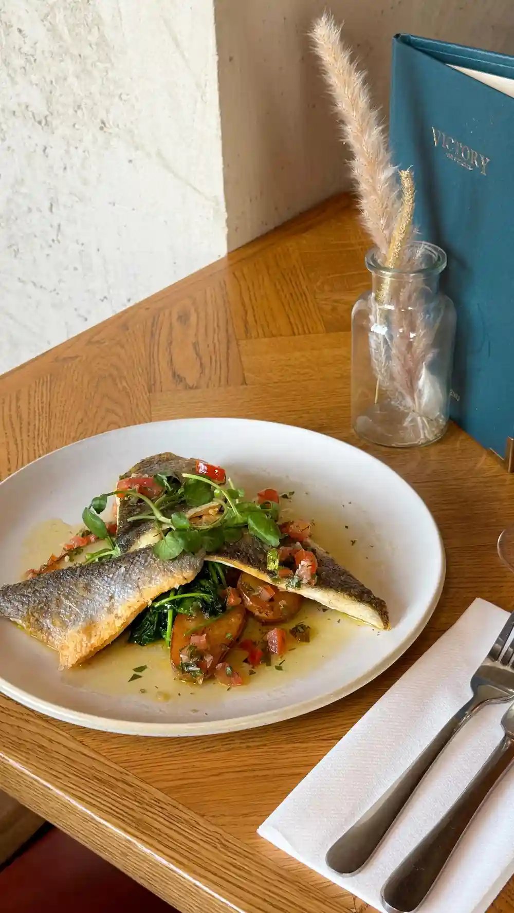 NEW ON THE MENU 🍽️: our Fresh Sea Bass Fillet - with sautéed spinach, new potatoes, sauce vierge & garlic herb butter. 

This dish really screams Spring on a plate 🌱